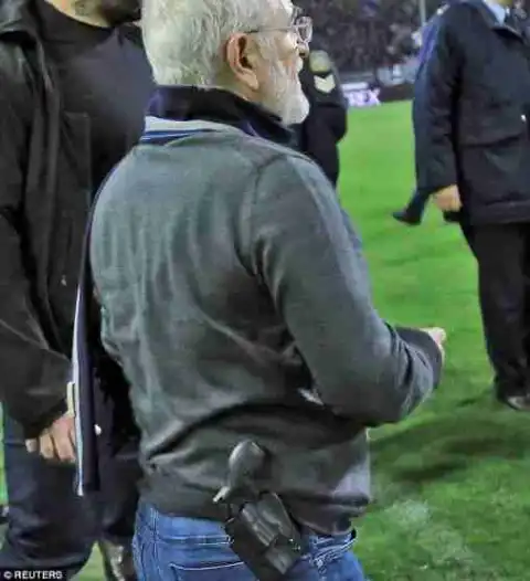 " You're Finished": Football Chairman Confronts Referee On The Pitch With A Pistol (Photos)